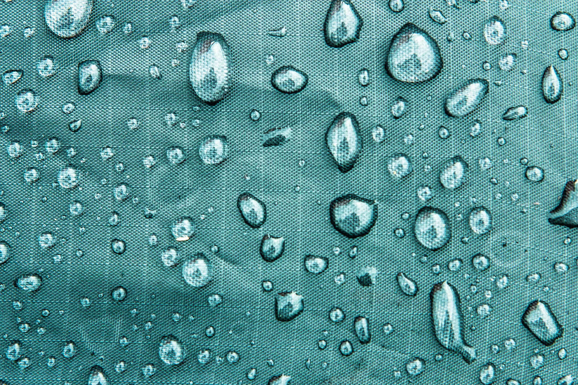 Waterdrops on blue fabric
